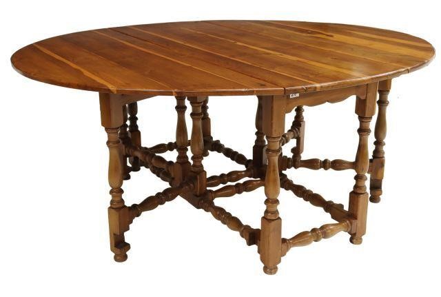 Appraisal: French Provincial fruitwood table th c having oval top fitted