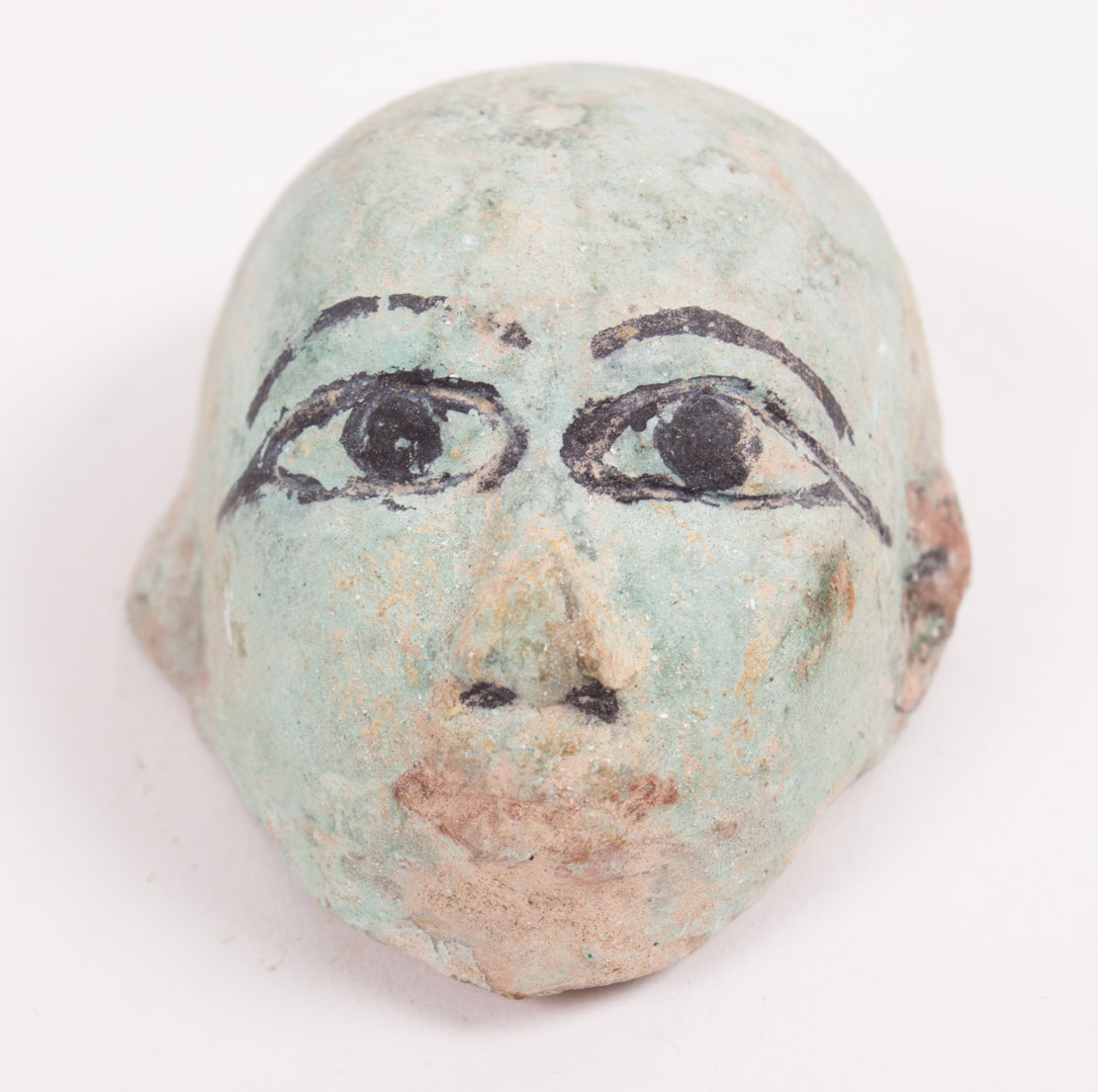 Appraisal: Egyptian painted earthenware substitute head Late Period in H