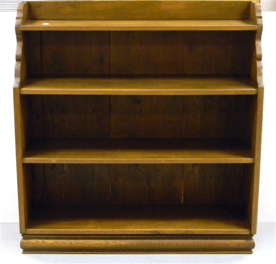 Appraisal: Tall mahogany bookshelf with shaped sides three shelves some checking