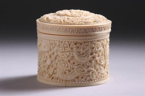 Appraisal: CHINESE IVORY BOX AND COVER Cylindrical-form with dragons carved in