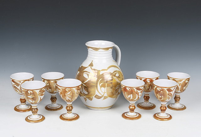 Appraisal: Alan Caiger-Smith British b Jug and eight goblets brush work