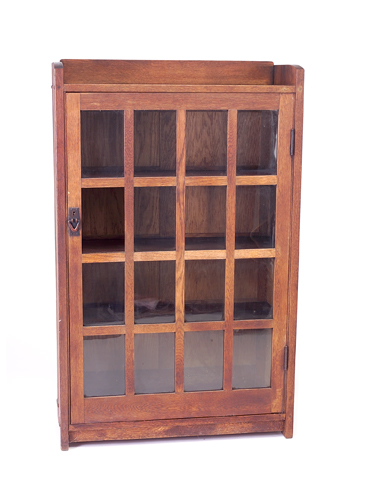 Appraisal: GUSTAV STICKLEY Single-door bookcase no with gallery top sixteen panes