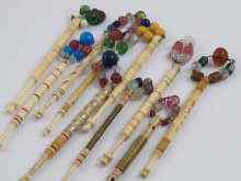 Appraisal: Ten bone lace bobbins stone mounted three with name formed