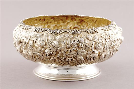 Appraisal: American sterling centerbowl floral and foliate repousse-chased squat bowl on