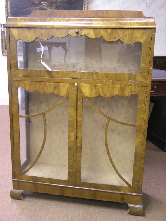 Appraisal: A 's burr walnut veneered display cabinet unusual form with