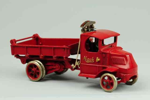 Appraisal: ARCADE MACK T-BAR DUMP TRUCK Cast iron done in red