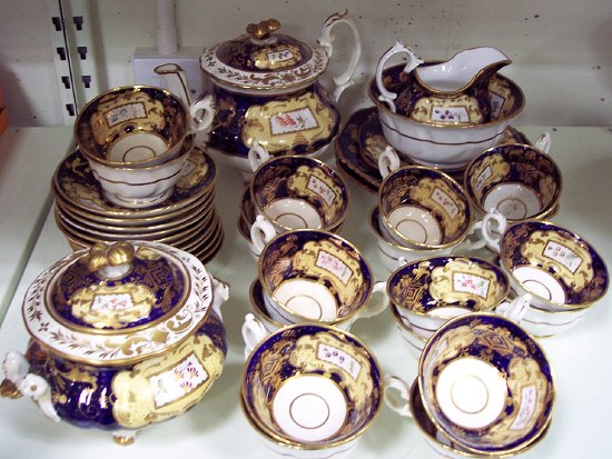 Appraisal: An early Victorian tea and coffee service painted differing sprays