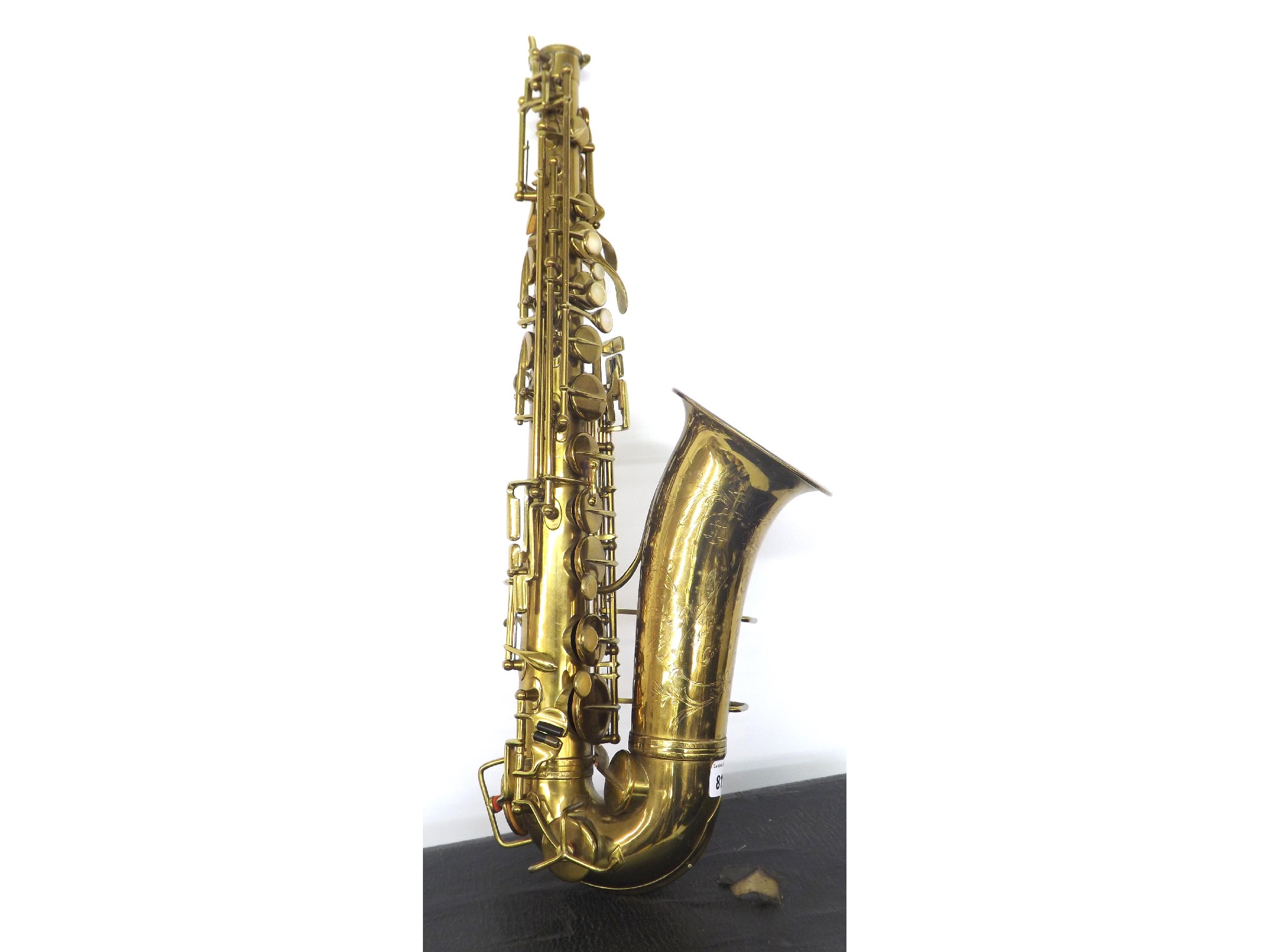 Appraisal: French Robert Drouet gold lacquered alto saxophone the foliate engraved