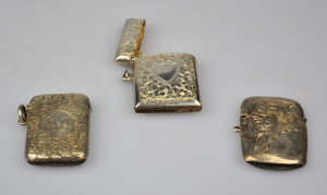 Appraisal: Three engraved silver vesta cases oz