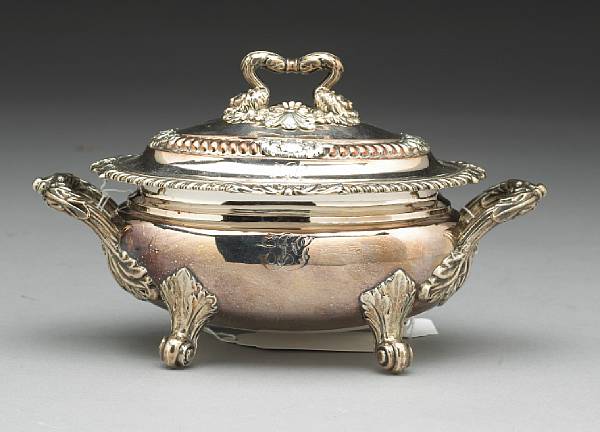 Appraisal: A Sheffield plate sauce tureen with coverEarly th centuryMonogrammed Length