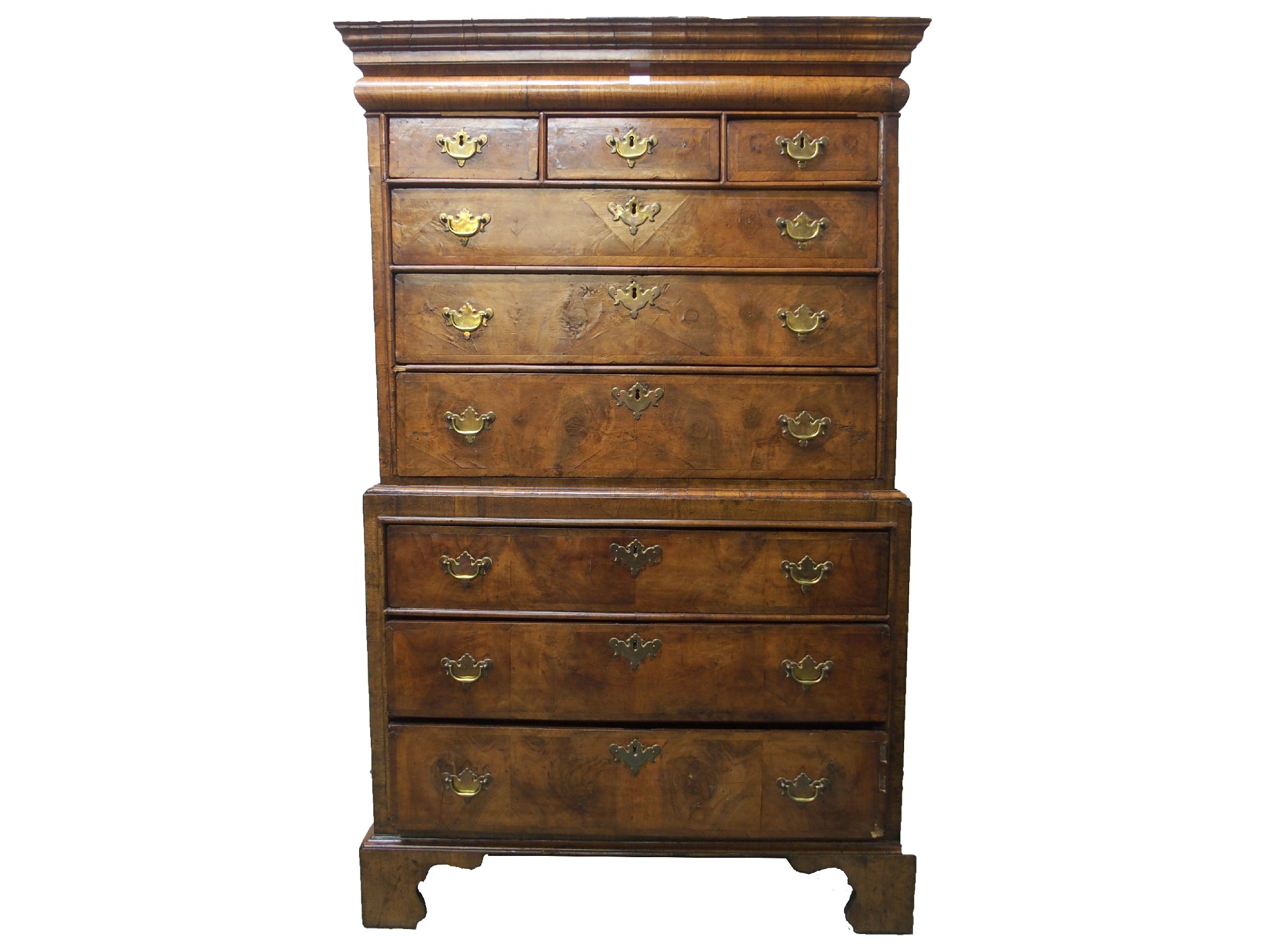 Appraisal: A walnut chest on chestthe upper section with three short