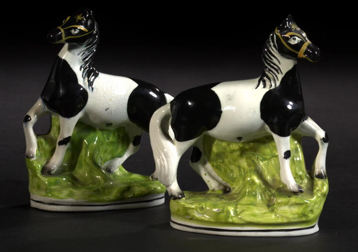 Appraisal: Attractive Pair of Staffordshire Pottery Black-and-White Shetland Pony Figures third