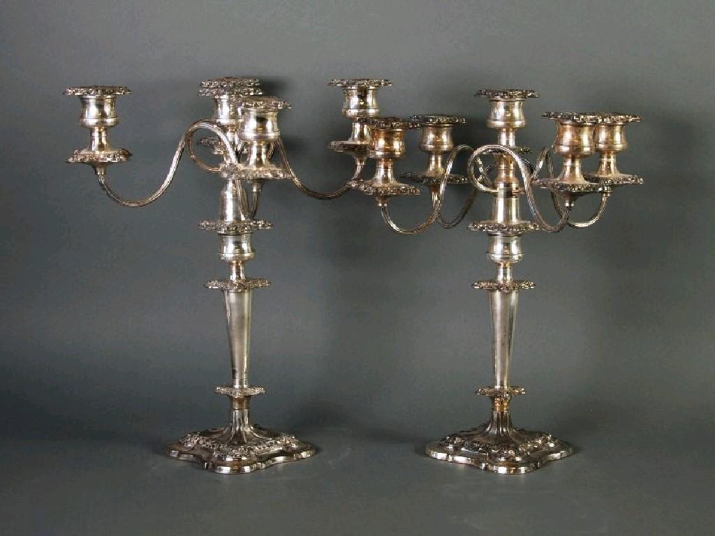 Appraisal: PAIR OF GEORGIAN STYLE ELECTROPLATED FOUR BRANCH CANDELABRA each with