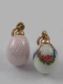 Appraisal: Two miniature ct gold guilloche enamelled gold eggs Marks for