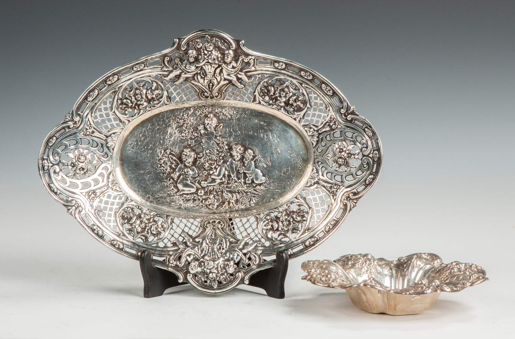 Appraisal: Silver Reticulated Basket th cent With cherubs garland silver ozt