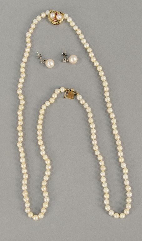 Appraisal: Woman's double strand pearl necklace with karat gold clasp along