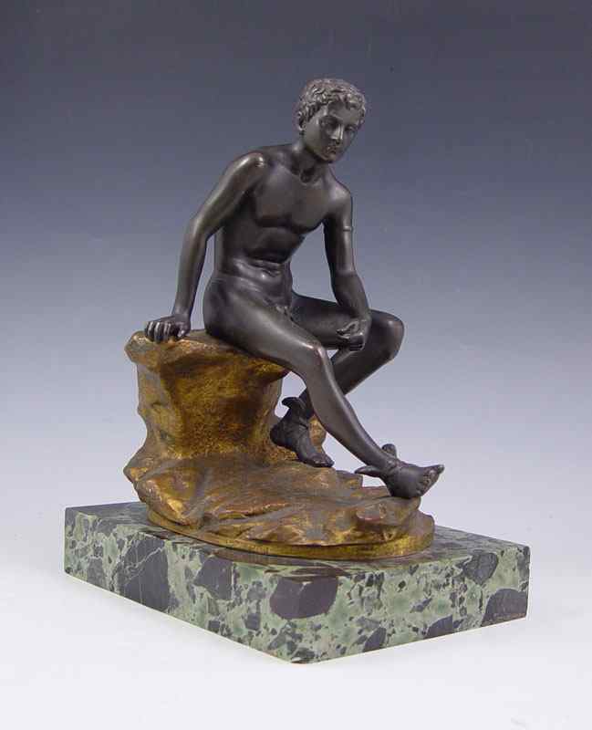 Appraisal: CONTINENTAL BRONZE OF A YOUNG SEATED MERCURY Two-tone finish brown