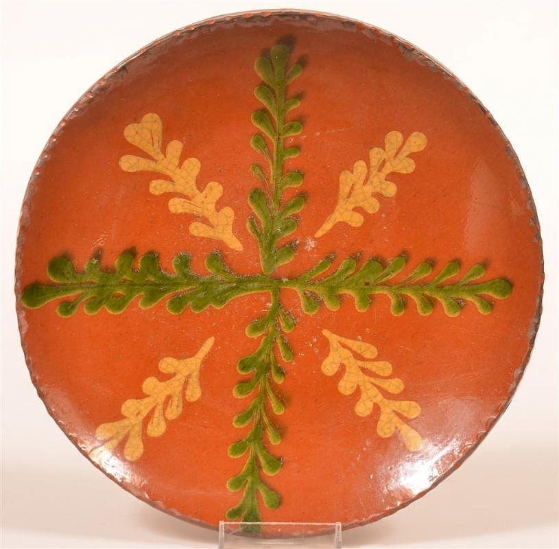 Appraisal: Shooner Redware Green and Yellow Slip Plate Shooner Redware Pottery