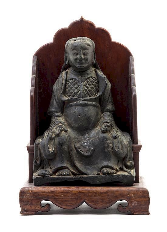 Appraisal: A Bronze Figure of a Taoist Immortal Height inches with