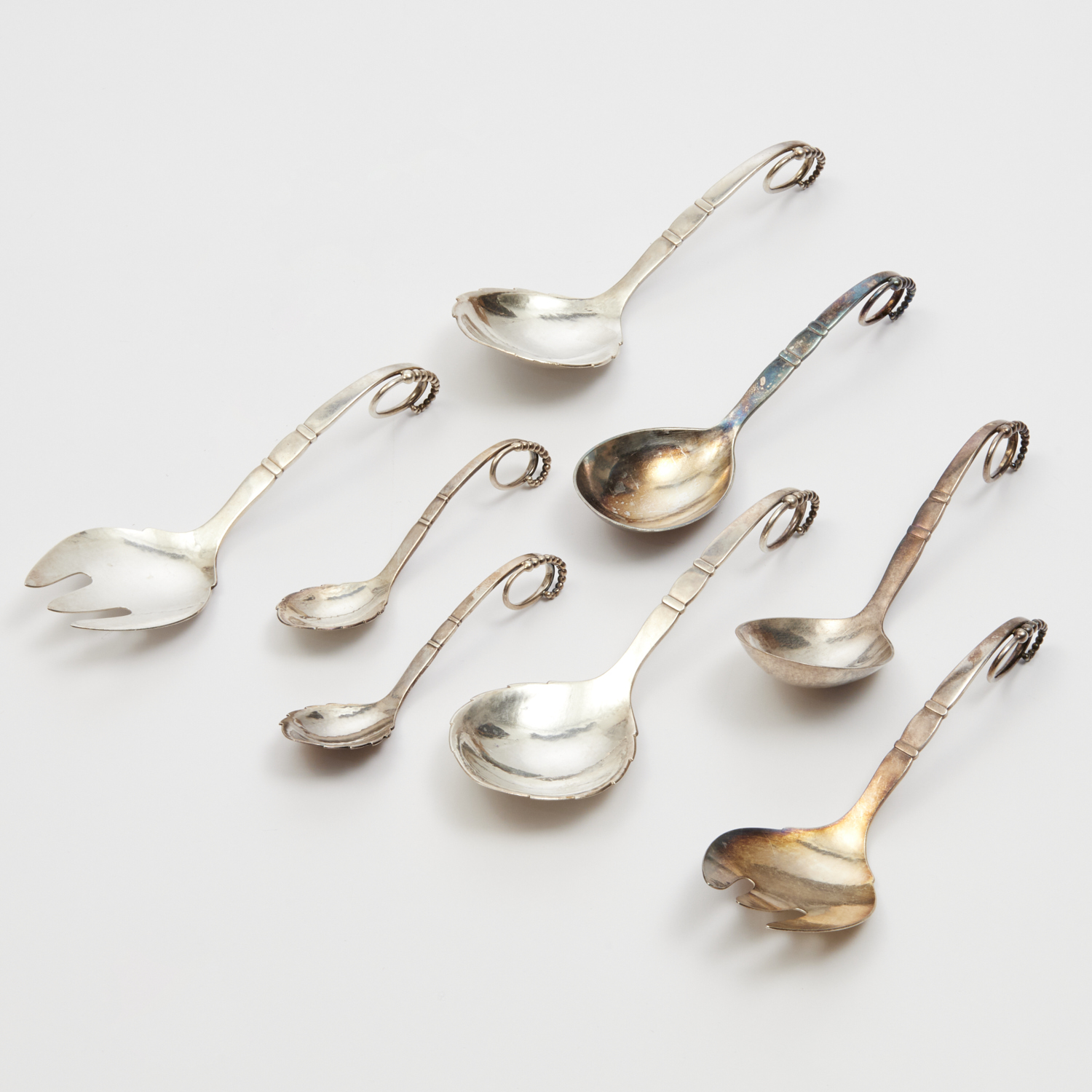 Appraisal: GEORG JENSEN 'ORNAMENTAL' SERVING PIECES Introduced Denmark sterling silver including