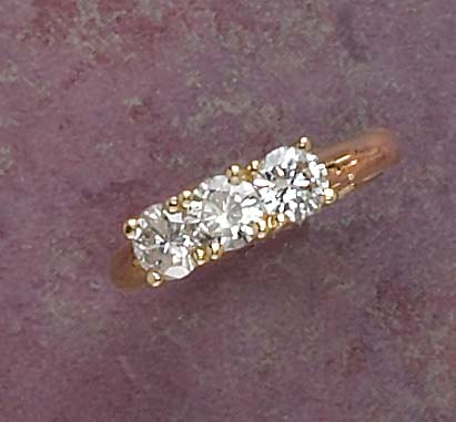 Appraisal: THREE STONE DIAMOND RING k yellow gold ring set with