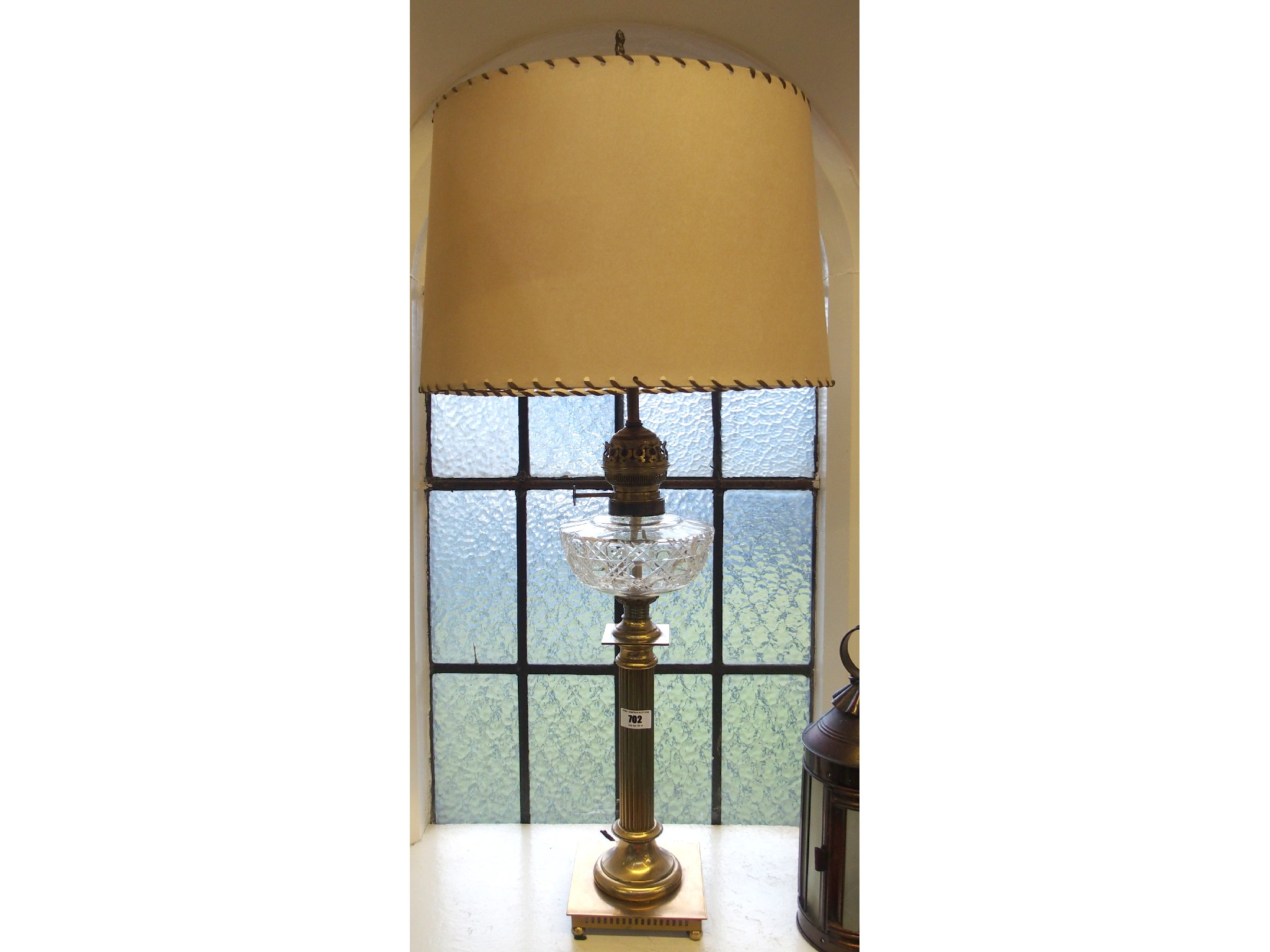 Appraisal: Reeded brass column oil lamp with cut glass reservoir now