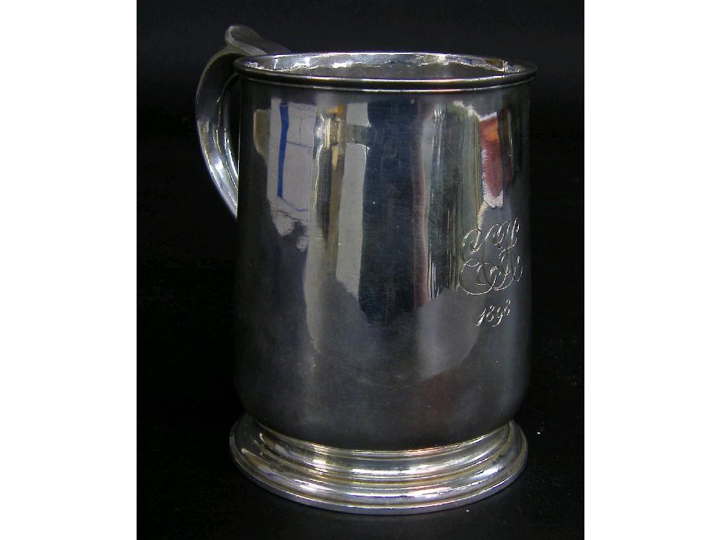 Appraisal: George II pedestal tankard with applied scrolling handle maker Richard