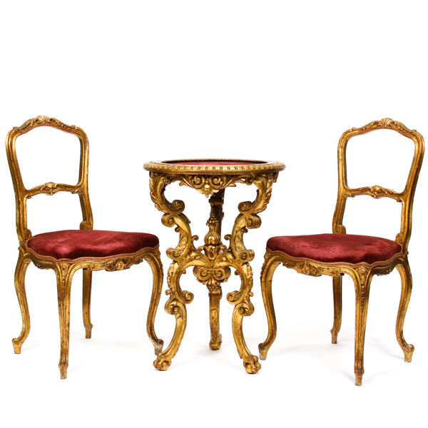 Appraisal: Continental Baroque carved and gilt gesso table and chairs Claw