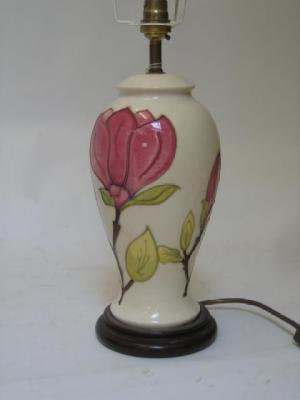 Appraisal: A MOORCROFT POTTERY LAMP of baluster form tube lined in