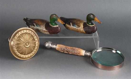 Appraisal: Pair of painted cast iron duck paperweights and magnifying glass