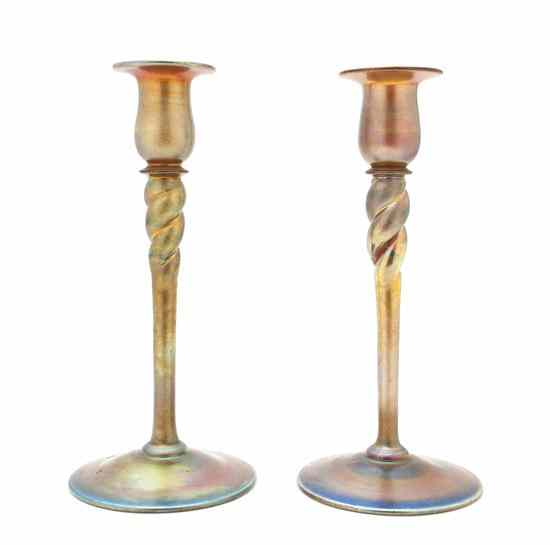 Appraisal: A Pair of Steuben Aurene Glass Candlesticks each having twisted