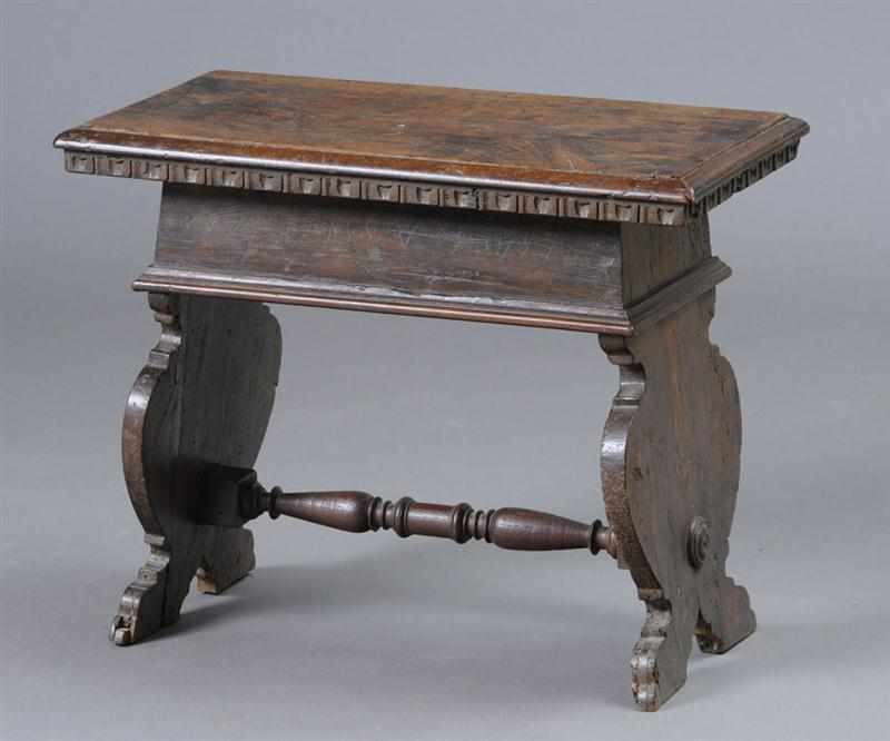 Appraisal: ITALIAN BAROQUE WALNUT STOOL The molded seat applied with an