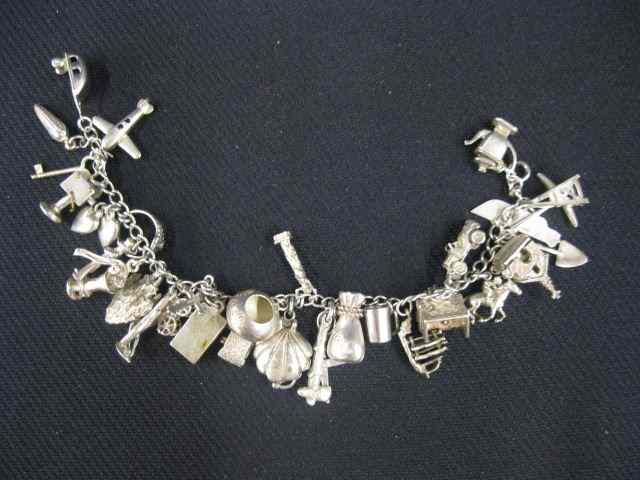 Appraisal: Sterling Silver Charm Bracelet charms many mechanical '' long grams