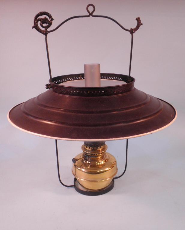 Appraisal: A thC brass and iron hanging oil lamp and shade