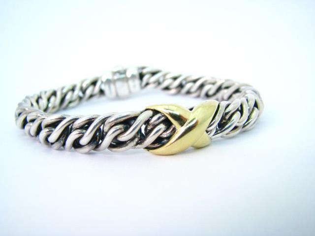 Appraisal: A David Yurman sterling silver wheat chain bracelet with K