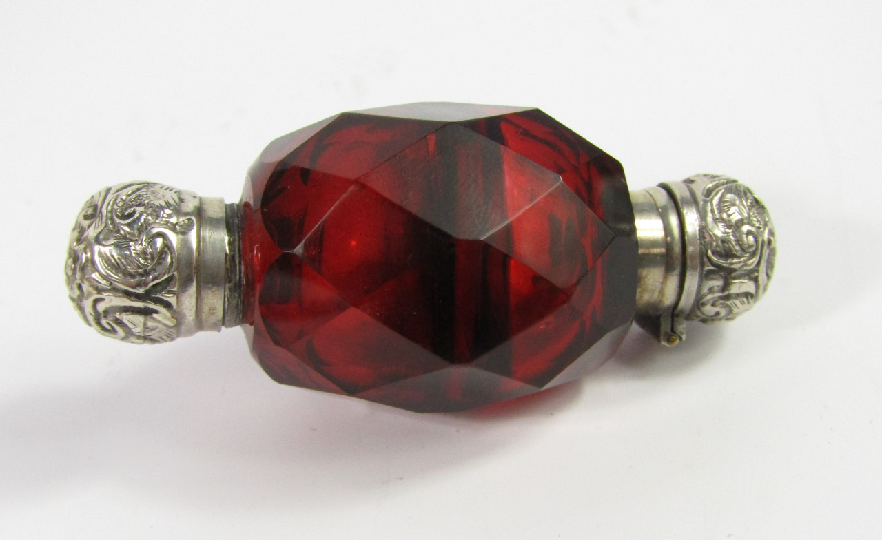 Appraisal: A Victorian cranberry glass double ended scent and smelling salts