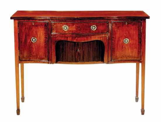 Appraisal: Georgian style mahogany serpentine sideboard shaped rectangular top above conforming