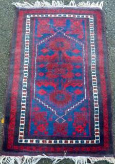 Appraisal: Persian type red ground rug with stepped medallion cm x