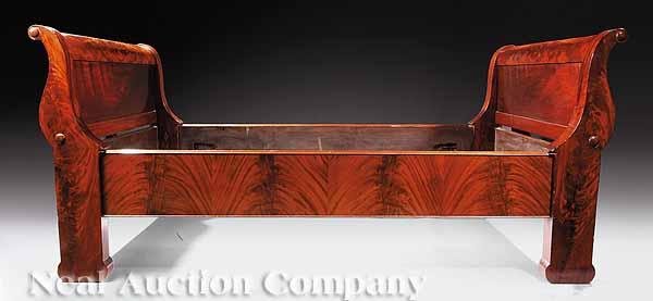 Appraisal: An American Late Classical Carved Mahogany Sleigh Bed mid- th