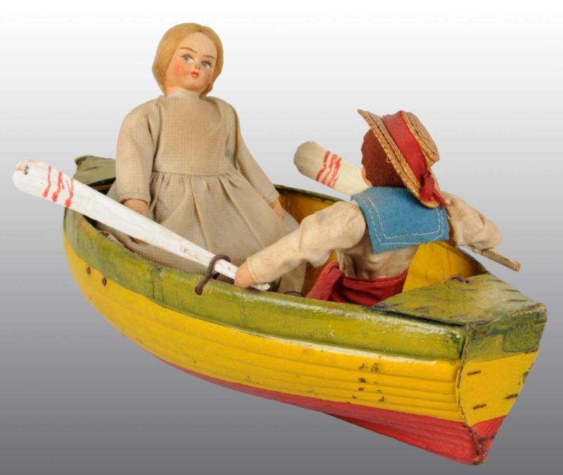 Appraisal: Rowboat Toy Description Italian Ca s Papier-mach rowboat with two