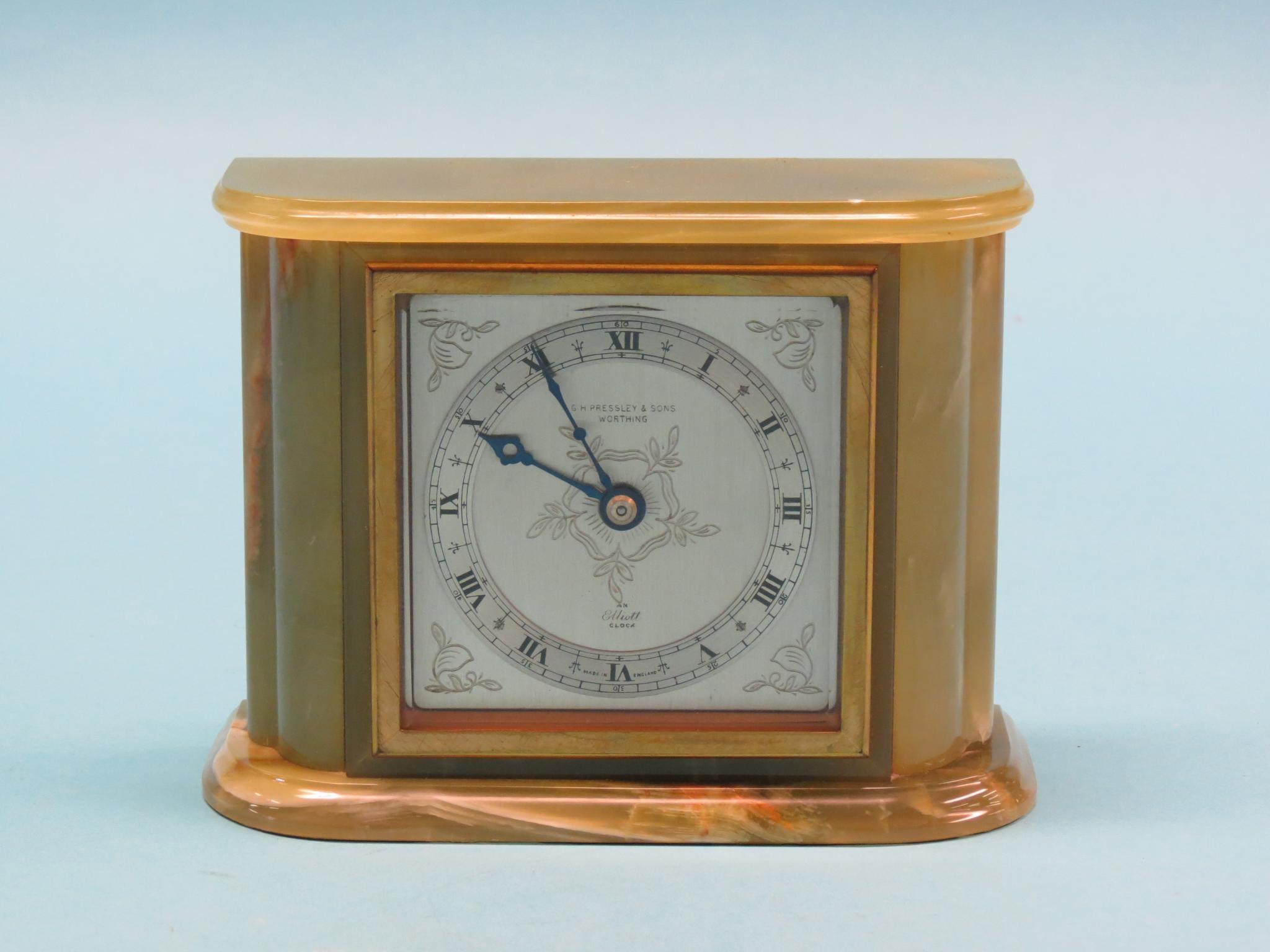 Appraisal: An Elliott mantel clock in silvered dial and timepiece movement