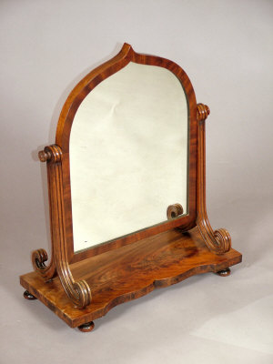 Appraisal: An early Victorian mahogany swing toilet mirror the arched Gothic