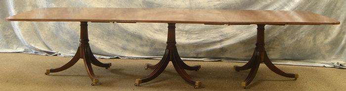 Appraisal: Three part mahogany Regency style banquet table with two extra