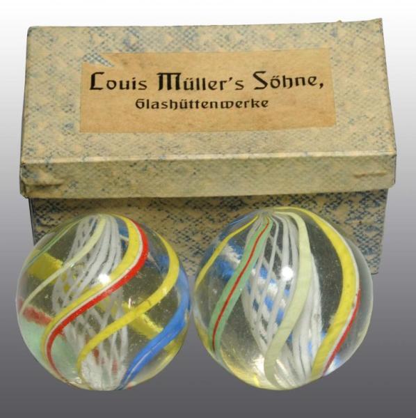 Appraisal: Lot of Latticino Swirl Marbles Box Description Both marbles are