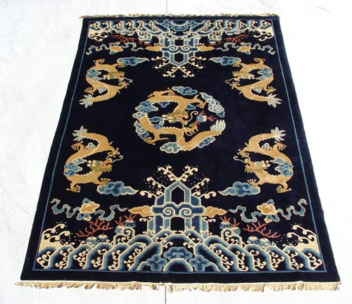 Appraisal: CHINESE DECO CARPET Approx ft x ft Dragon motif blue