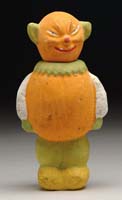 Appraisal: COMPOSTION VEGETABLE MAN CANDY CONTAINER Head and chest painted orange