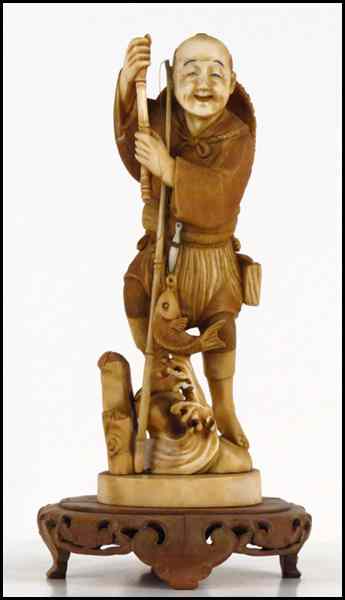 Appraisal: JAPANESE CARVED IVORY FIGURE OF A FISHERMAN Provenance The Collection