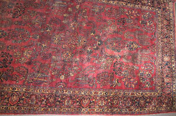 Appraisal: A Sarouk carpet size approximately ft x ft