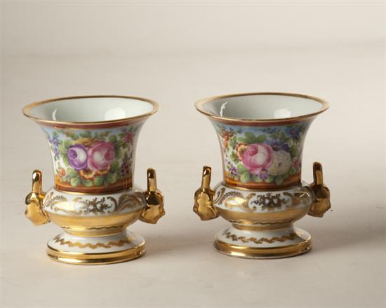 Appraisal: A Pair of French Porcelain Campagna Urns having floral designs