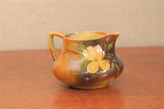 Appraisal: ROOKWOOD CREAMER Standard glaze with floral decoration Signed with reverse